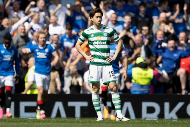 Celtic defender Yuki Kobayahsi looks on during a difficult afternoon for the champions at Ibrox.