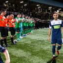 Raith's Lewis Vaughan walks out to a guard of honour ahead of his own testimonial match against Hibs at Stark's Park.  (Photo by Ross Parker / SNS Group)