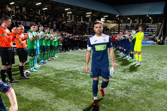 Raith's Lewis Vaughan walks out to a guard of honour ahead of his own testimonial match against Hibs at Stark's Park. (Photo by Ross Parker / SNS Group)