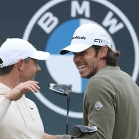 Rory McIlroy shares a laugh with Gareth Bale during the BMW PGA Championship Pro-Am at Wentworth Club last week. Picture: Richard Heathcote/Getty Images.