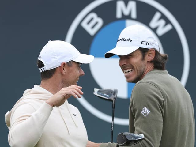 Rory McIlroy shares a laugh with Gareth Bale during the BMW PGA Championship Pro-Am at Wentworth Club last week. Picture: Richard Heathcote/Getty Images.