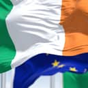 The national flag of Ireland waving in the wind with the European Union flag. Picture: Getty Images