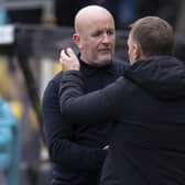 Livingston manager David Martindale embraces Celtic counterpart Brendan Rodgers after the 3-0 defeat. (Photo by Ross MacDonald / SNS Group)