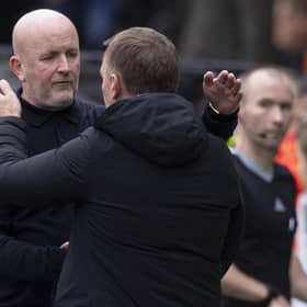 Livingston manager David Martindale embraces Celtic counterpart Brendan Rodgers after the 3-0 defeat. (Photo by Ross MacDonald / SNS Group)