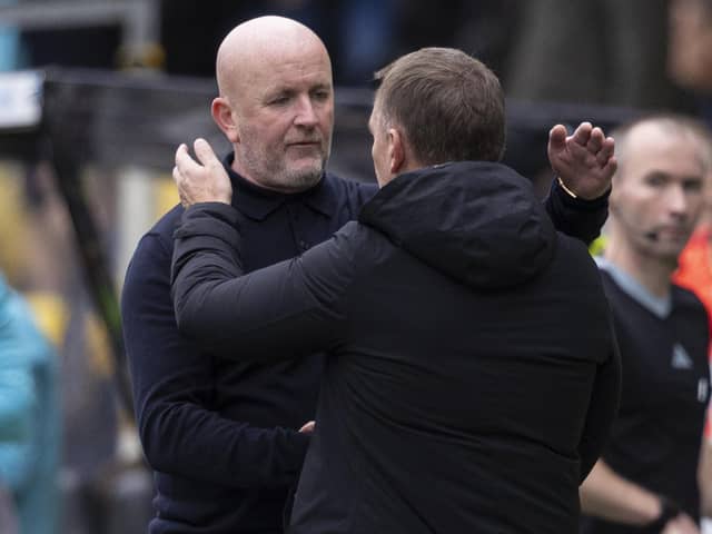 Livingston manager David Martindale embraces Celtic counterpart Brendan Rodgers after the 3-0 defeat. (Photo by Ross MacDonald / SNS Group)