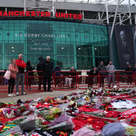 A general view of floral tributes to Sir Bobby Charlton placed at Old Trafford.