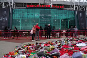 A general view of floral tributes to Sir Bobby Charlton placed at Old Trafford.