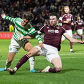 Hearts defender John Souttar in action against Celtic last week - could he face them again in a Rangers jersey on Wednesday night? (Photo by Ross Parker / SNS Group)