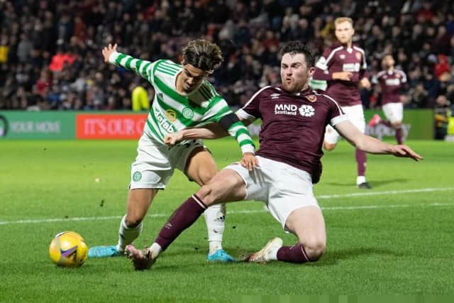 Hearts defender John Souttar in action against Celtic last week - could he face them again in a Rangers jersey on Wednesday night? (Photo by Ross Parker / SNS Group)