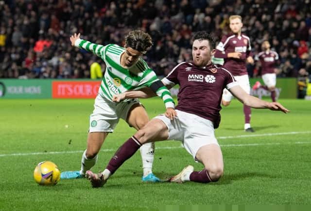 Hearts defender John Souttar in action against Celtic last week - could he face them again in a Rangers jersey on Wednesday night? (Photo by Ross Parker / SNS Group)