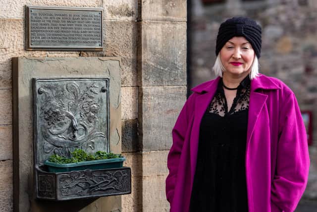 QC Claire Mitchell at the Witches' Well memorial, on Edinburgh Castle esplanade.