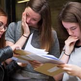 Pupils receive their results. Photo by Dan Kitwood/Getty Images