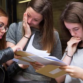 Pupils receive their results. Photo by Dan Kitwood/Getty Images