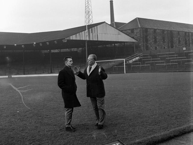Norwegian footballer Roald Jensen is pictured on the pitch with trainer Johnny Harvey shortly after joining Hearts from SK Brann Bergen in 1964.