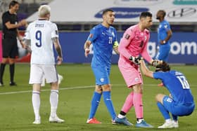 Players react to the draw at the end of the 2022 FIFA World Cup qualifier group F football match between Israel and Scotland at Bloomfield stadium in the Israeli Mediterranean coastal city of Tel Aviv on March 28, 2021. (Photo by JACK GUEZ / AFP) (Photo by JACK GUEZ/AFP via Getty Images)