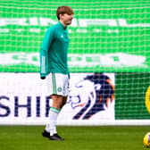 Celtic youngster Adam Montgomery warms up after signing a new deal with the Parkhead club. Picture: SNS
