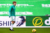 Celtic youngster Adam Montgomery warms up after signing a new deal with the Parkhead club. Picture: SNS