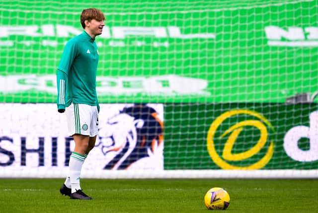 Celtic youngster Adam Montgomery warms up after signing a new deal with the Parkhead club. Picture: SNS