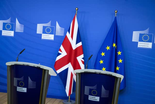 Two rostrums stand prepared for a possible joint statement after a dinner meeting by Britain's Prime Minister Boris Johnson and European Commission president Ursula von der Leyen, in Brussels. Picture: Aaron Chown/Pool via AP