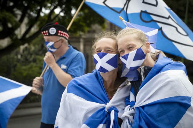 Members from All Under One Banner take part in a static demonstration for Scottish independence outside the Scottish Parliament in Edinburgh. Picture: Jane Barlow/PA Wire