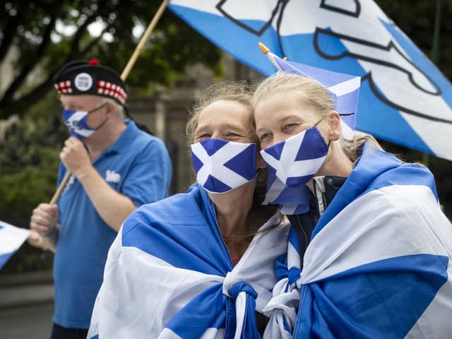 Members from All Under One Banner take part in a static demonstration for Scottish independence outside the Scottish Parliament in Edinburgh. Picture: Jane Barlow/PA Wire