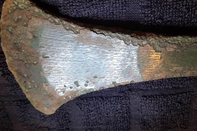 The highly patterned axe head could be around 4,000 years old with the find to be passed to the Treasure Trove Unit for further investigation. PIC: Contributed