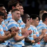 Finn Russell, centre, is likely to be delayed in joining up with Scotland if Racing 92 make the Top 14 play-offs. (Photo by FRANCK FIFE/AFP via Getty Images)