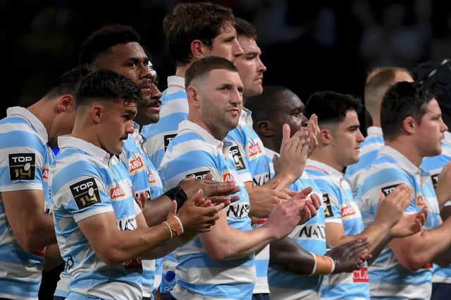 Finn Russell, centre, is likely to be delayed in joining up with Scotland if Racing 92 make the Top 14 play-offs. (Photo by FRANCK FIFE/AFP via Getty Images)