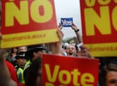 Supporters of the Yes and No campaigns gather outside Dumbarton Town Hall in September 2014 ahead of the Scottish independence referendum (Picture: Peter Macdiarmid/Getty Images)