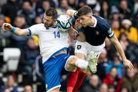 Scotland's Ryan Christie (R) and Cyprus' Valentin Roberge during a UEFA Euro 2024 Qualifier between Scotland and Cyprus at Hampden Park, on March 25, 2023, in Glasgow, Scotland. (Photo by Craig Williamson / SNS Group)