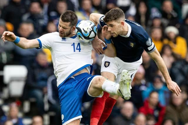 Scotland's Ryan Christie (R) and Cyprus' Valentin Roberge during a UEFA Euro 2024 Qualifier between Scotland and Cyprus at Hampden Park, on March 25, 2023, in Glasgow, Scotland. (Photo by Craig Williamson / SNS Group)