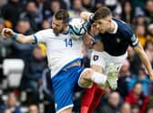 Scotland's Ryan Christie (R) and Cyprus' Valentin Roberge during a UEFA Euro 2024 Qualifier between Scotland and Cyprus at Hampden Park, on March 25, 2023, in Glasgow, Scotland. (Photo by Craig Williamson / SNS Group)