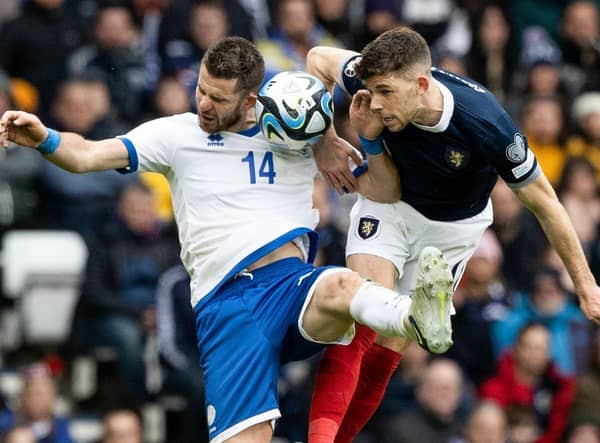 Scotland's Ryan Christie (R) and Cyprus' Valentin Roberge during a UEFA Euro 2024 Qualifier between Scotland and Cyprus at Hampden Park, on March 25, 2023, in Glasgow, Scotland. (Photo by Craig Williamson / SNS Group)