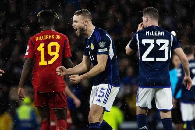 Ryan Porteous celebrates following Scotland's famous 2-0 win over Spain. (Photo by Craig Williamson / SNS Group)