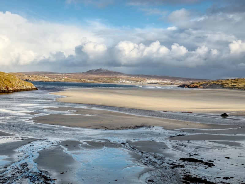 Uig Sands sits around an inlet on the west coast of the Isle of Lewis, with the name derived from the Norse word for “bay”. Also known as Ardroil beach, an enormous stretch of beach is revealed at Uig Sands at low tide. Conde Nast Traveller has rated the beach at No.30 in its list of world's top beaches, saying in its review: “Lying some 20 miles west of Stornoway on Lewis’s surf-battered Atlantic coast, this is a big, dramatic beach watched over by tussocky dunes and grizzled mountains"