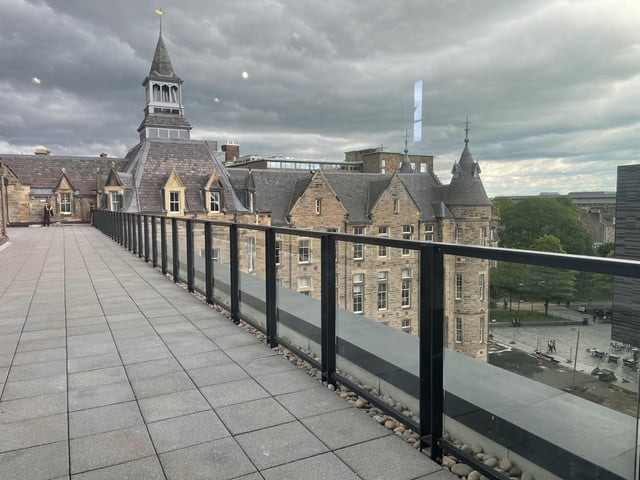 Outdoor walkways offer commanding views over the Edinburgh skyline