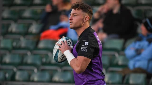 Warriors' Jack Dempsey was injured in the early stages of the match against Ospreys in Swansea. (Photo by Ross MacDonald / SNS Group)