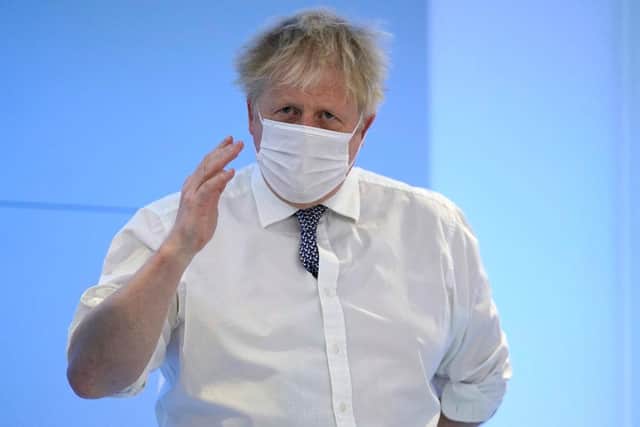 Prime Minister Boris Johnson visits to the Rutherford Diagnostic Centre on January 20, 2022 in Taunton, Somerset, England.  Photo by Andrew Matthews-WPA Pool/Getty Images