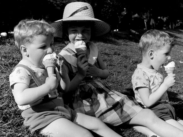 Some happy children are pictured enjoying the summer with ice creams in Princes Street Gardens in June 1965.