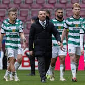 Celtic manager Brendan Rodgers looks dejected as he leads his players off Tynecastle following the 2-0 defeat by Hearts.