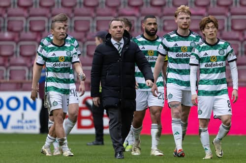 Celtic manager Brendan Rodgers looks dejected as he leads his players off Tynecastle following the 2-0 defeat by Hearts.