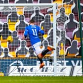 Cedric Itten heads home from a Borna Barisic cross to secure a point for Rangers against Motherwell at Fir Park. (Photo by Craig Williamson / SNS Group)