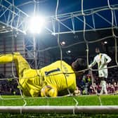 Hearts goalkeeper Craig Gordon saves Ayo Obileye's decisive penalty in the shootout. (Photo by Ross Parker / SNS Group)