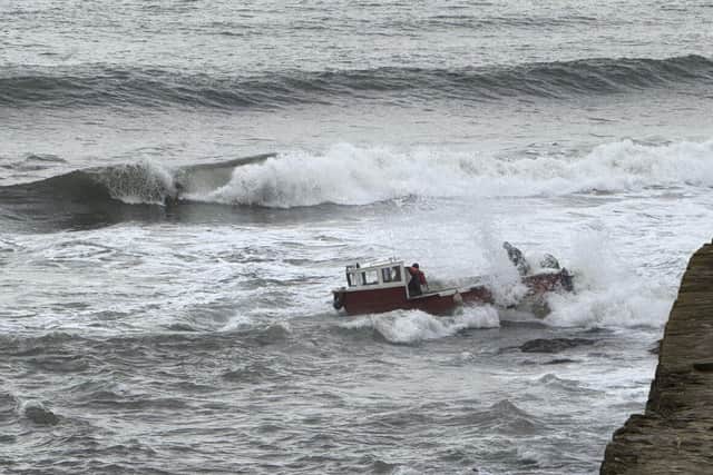 The boat is submerged by the weaves at St Andrews (Pic: Andrew Donald)