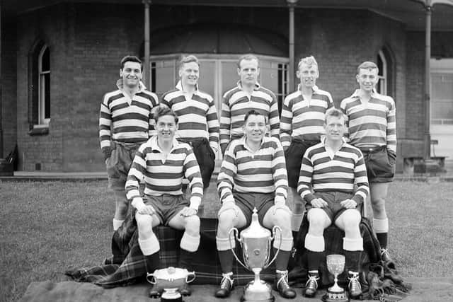 Eddie McKeating, back row second from left, in a Heriot's FP sevens side of the 1950s, with his great friend Ken Scotland second from the right in the back row.