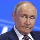 Russian President Vladimir Putin has banned four Scottish MPs