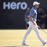 Rory McIlroy celebrates after holing the winning putt in the Hero Dubai Desert Classic at Emirates Golf Club. Picture: Ross Kinnaird/Getty Images.