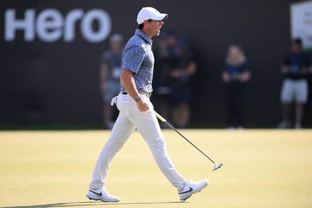 Rory McIlroy celebrates after holing the winning putt in the Hero Dubai Desert Classic at Emirates Golf Club. Picture: Ross Kinnaird/Getty Images.