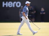 Rory McIlroy celebrates after holing the winning putt in the Hero Dubai Desert Classic at Emirates Golf Club. Picture: Ross Kinnaird/Getty Images.