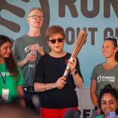 First Minister Nicola Sturgeon greeted runners at the finish line of a special long-distance relay which set off from Glasgow 40 days ago, carrying a symbolic baton nearly 5,000 miles through 18 countries to reach the Egyptian resort town of Sharm El-Sheikh in time for the COP27 summit. Running Out of Time is the longest non-stop relay ever staged and involved thousands of runners, with the aim of highlighting the climate emergency.